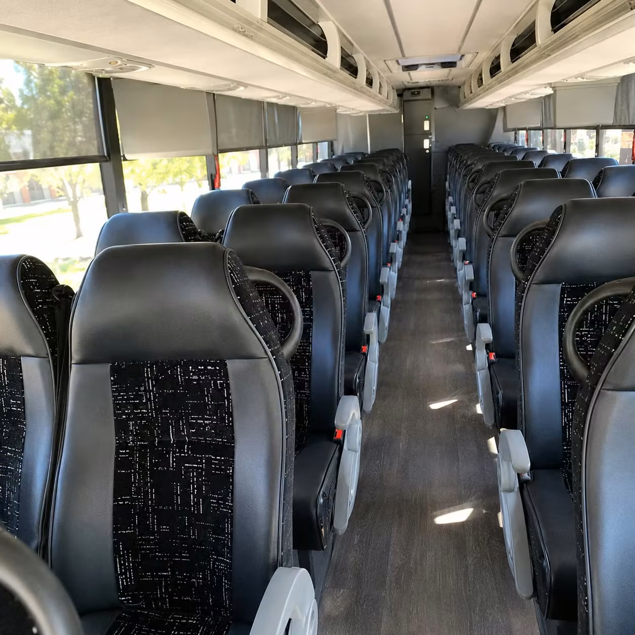 use a charter bus to transport sammamish students to the burke museum and uw campus